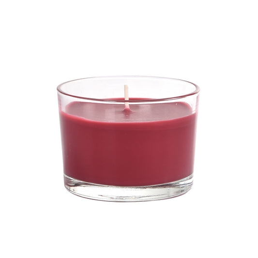 Das Kerzenglas "Ibiza" von Duni GmbH (ca. 18h, 58 x 85 mm) mit rotem Wachs und weißem Docht sorgt auf weißem Hintergrund für stimmungsvolle Beleuchtung.