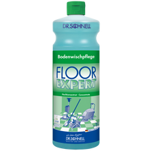 Eine grün-blaue Flasche der DR.SCHNELL GmbH & Co. KGaA Dr. Schnell FLOOR EXPERT Bodenreiniger Konzentrat zeigt auf dem Etikett einen deutschen Text und Abbildungen von Menschen, die Böden reinigen.
