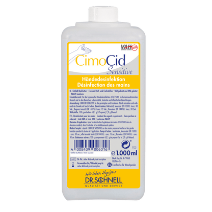 Prostokątna butelka 1-litrowa Dr. Schnell CIMOCID SENSITIVE do dezynfekcji rąk firmy DR.SCHNELL GmbH & Co. KGaA z niemiecką i francuską instrukcją użytkowania na biało-żółtej etykiecie i białą zakrętką do skutecznej redukcji zarazków.