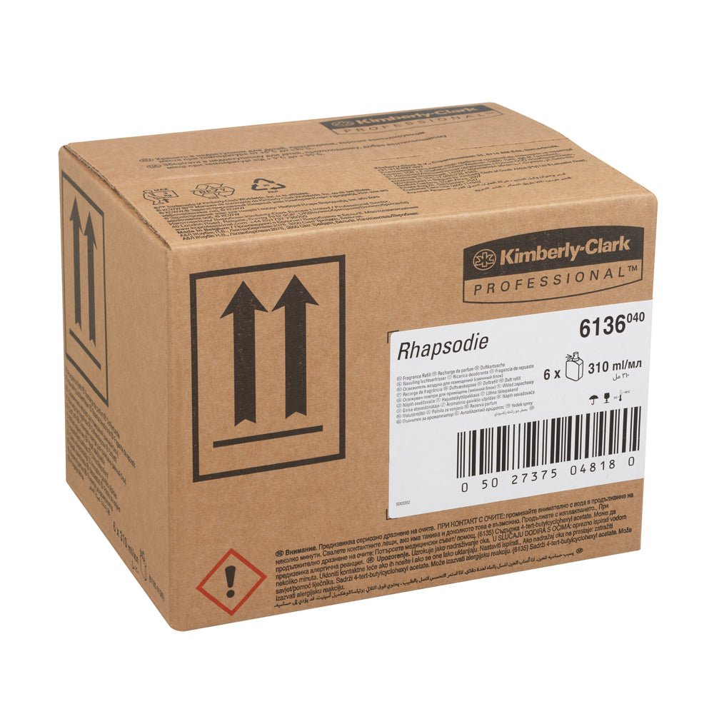 Brązowe pudełko kartonowe z napisem "Kimberly-Clark Professional™ zapach RHAPSODIE - opakowanie uzupełniające/Przezroczyste/310 ml - 6 kaset" od Kimberly-Clark GmbH, idealne do odświeżaczy powietrza w toaletach lub dyfuzorów zapachowych do toalet, z informacjami o produkcie i symbolami ostrzegawczymi.