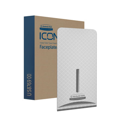 Wzorzysta szara Kimberly-Clark Professional™ Icon™ Dispenser Faceplate - FTT (27,80 x 13,10 x 1,40 cm) od Kimberly-Clark GmbH stoi przed swoim opakowaniem z napisem "ICON Folded Toilet Tissue Dispenser Faceplate" i idealnie pasuje do każdego wystroju toalety.