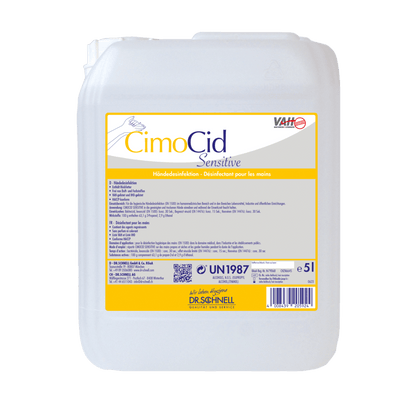 Biały 5-litrowy plastikowy pojemnik Dr. Schnell CIMOCID SENSITIVE do dezynfekcji rąk firmy DR.SCHNELL GmbH & Co. KGaA z żółtą etykietą oferuje delikatną ochronę skóry i skuteczne redukcję zarazków z wielojęzycznymi instrukcjami użytkowania i bezpieczeństwa.