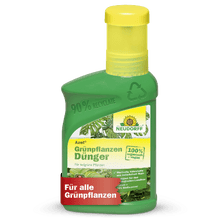 Zielona plastikowa butelka z Neudorff Shop Azet GrünpflanzenDünger płynny z żółtą nakrętką, oznaczona jako 100% organiczny wegański nawóz do roślin zielonych, dostarcza niezbędnych składników odżywczych i ma symbol recyklingu z niemieckim tekstem.
