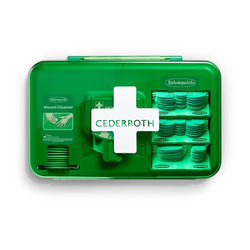 Niebieski dozownik do opatrunków Orkla Wound Care AB (1 opakowanie), zawierający produkty do opatrywania ran i materiały opatrunkowe, stoi na białym tle.