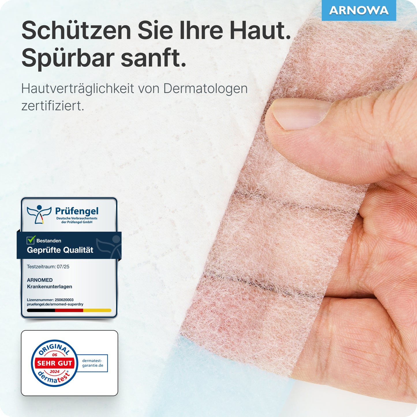 Ręka zdejmuje przezroczysty bandaż z podkładu ARNOMED SUPERDRY PLUS od ARNOWA GmbH. Niemiecki tekst podkreśla ochronę skóry, certyfikację dermatologiczną i plakiety jakości, z logo ARNOWA widocznym w prawym górnym rogu.