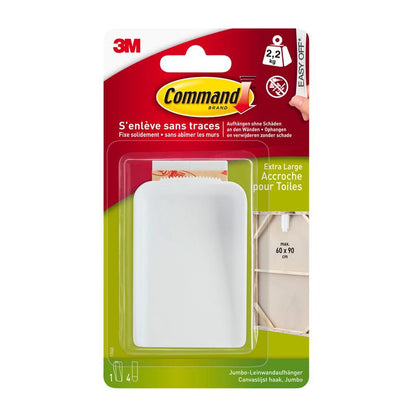 Wieszak Command™ na płótno firmy 3M Deutschland GmbH w wersji ekstra dużej jest pokazany w swoim opakowaniu, które posiada ograniczenie wagowe do 2,2 kg oraz prezentuje informacje o produkcie w języku angielskim i francuskim.