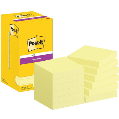 Żółte pudełko z napisem „Post-it® Super Sticky Notes, 76 mm x 76 mm, 90 arkuszy/blok” od 3M Deutschland GmbH jest pokazane obok kilku stosów żółtych kwadratowych bloków karteczek samoprzylepnych ułożonych w dwóch grupach.
