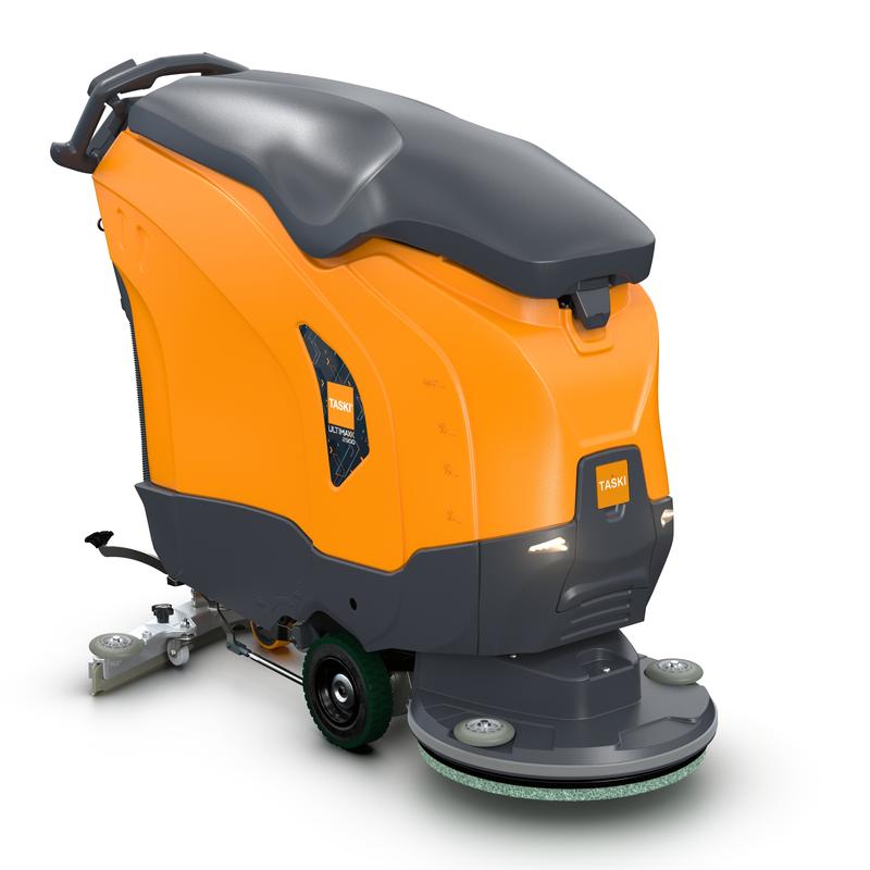 TASKI ULTIMAXX 2900 SD50 od Diversey Deutschland GmbH & Co. OHG to szorowarka nowej generacji z pomarańczowo-szarym korpusem, zbiornikiem o pojemności 63 litrów, tylnym uchwytem sterującym, kołami i szczotką na dole. Przedstawiona na prostym białym tle.