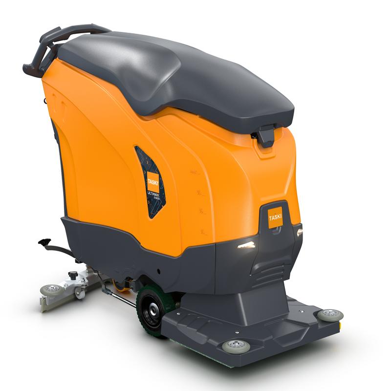 TASKI ULTIMAXX 2900 OB50 Performance od Diversey Deutschland to nowej generacji pomarańczowo-szara maszyna szorująco-odsysająca z napędem na koła, 63-litrowym zbiornikiem i 50-cm orbitą, zaprojektowana do użytku przemysłowego lub komercyjnego.