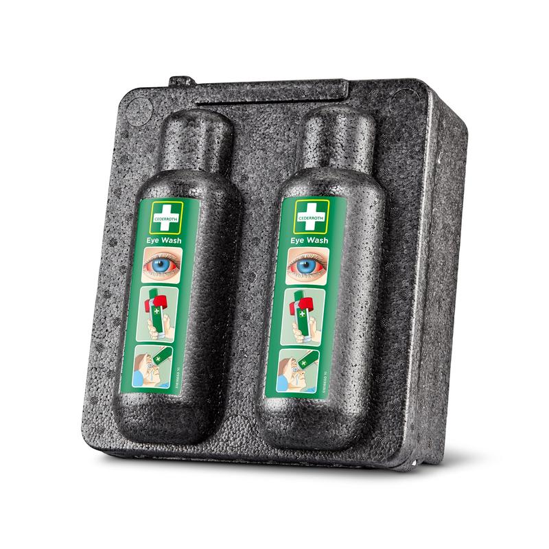 Szafka grzewcza Orkla Wound Care AB do płukania oczu 500x2 (1 opakowanie) mieści dwie butelki do płukania oczu z zielonymi etykietami piktogramów i zapewnia bezpieczne przechowywanie oraz szybki dostęp do pierwszej pomocy w nagłych przypadkach urazów oczu.