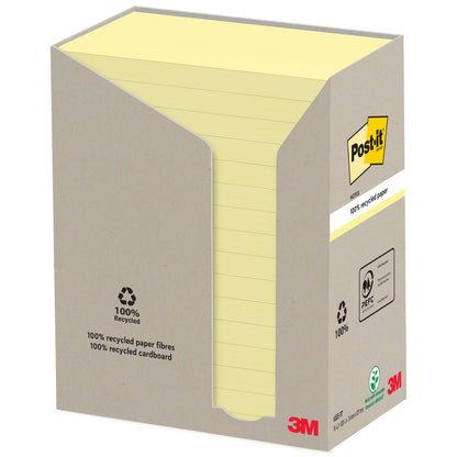 Pudełko z 3M Post-it® Recycling Notes (76 mm x 127 mm, 100 arkuszy, 100% PEFC) od 3M Deutschland GmbH jest częściowo otwarte, aby pokazać ułożone notatki wewnątrz, i ma symbole recyklingu oraz branding na opakowaniu.
