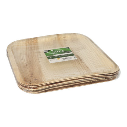 Stos kwadratowych PAPSTAR 6 talerzy z liścia palmowego „pure“ prostokątnych firmy PAPSTAR GmbH, zapakowanych w przezroczyste opakowanie z tworzywa sztucznego z zielono-białą etykietą na górze.