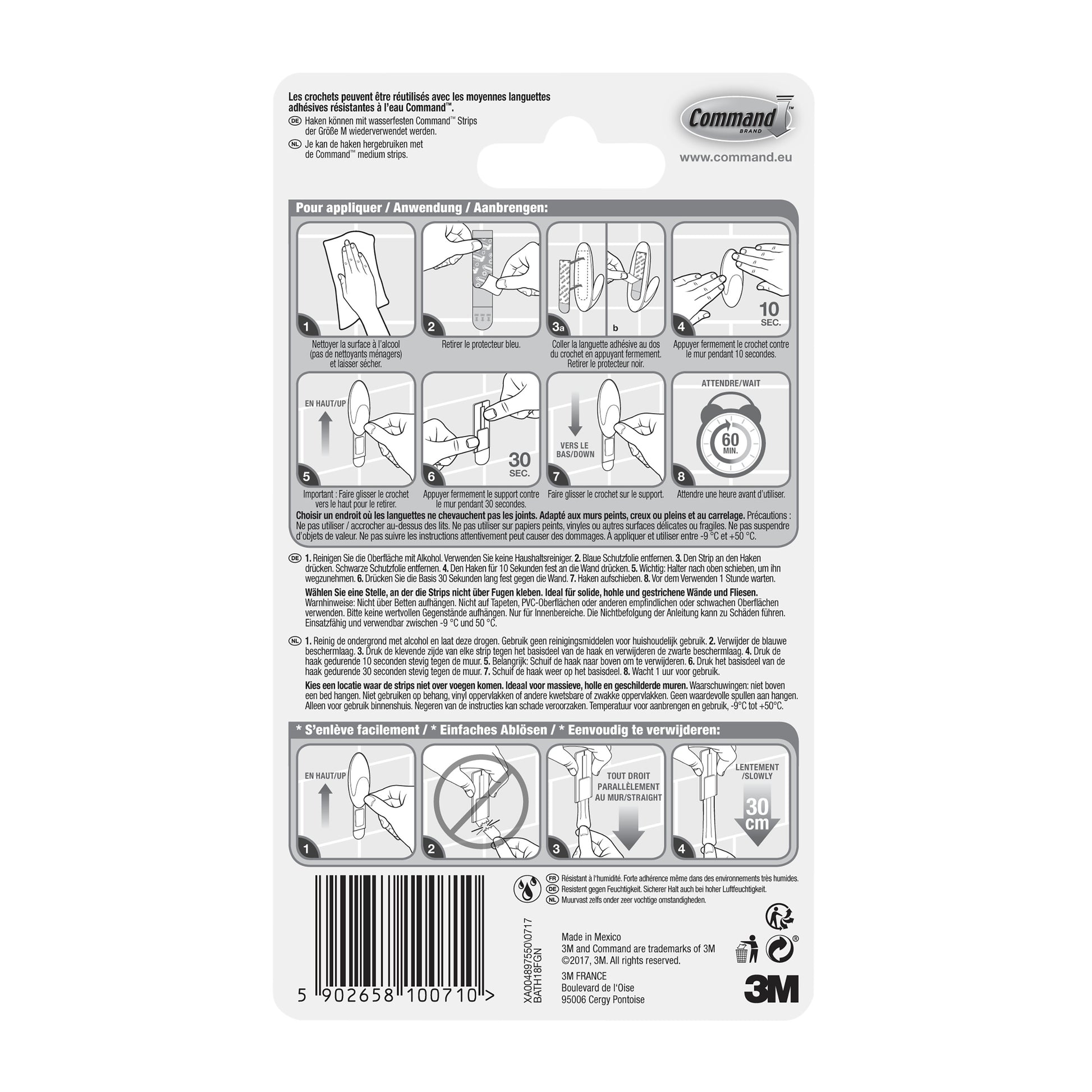 Die Rückseite einer Command™ Bad Handtuchhaken-Verpackung der 3M Deutschland GmbH enthält eine bebilderte und schriftliche Schritt-für-Schritt-Anleitung in mehreren Sprachen zum Anbringen und Entfernen der Streifen sowie einen Barcode und das 3M-Logo am unteren Rand.