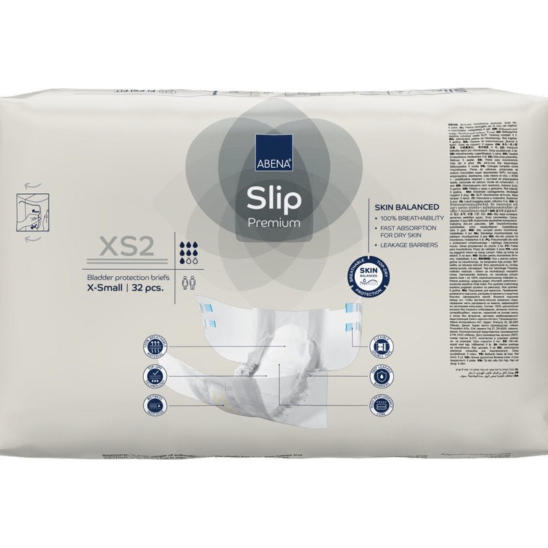 Zapieczętowane opakowanie ABENA Slip Premium od Abena Re-Seller GmbH, rozmiar X-Small, zawiera 32 slipy. Na przedniej stronie znajdują się najważniejsze cechy i diagram, dzięki czemu jest idealne do skutecznej ochrony przed nietrzymaniem moczu.