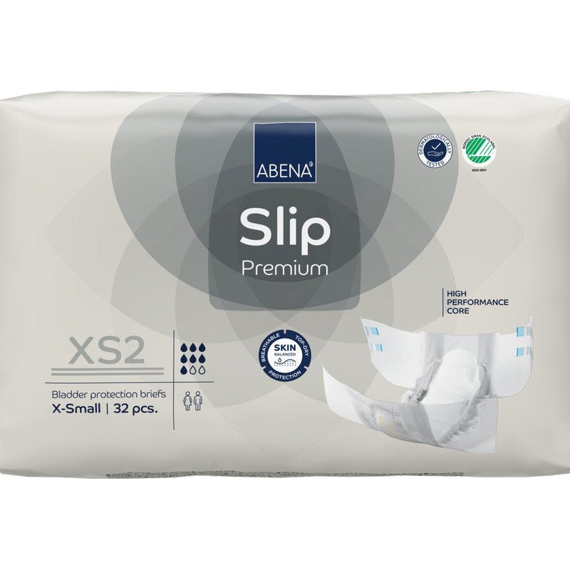 Opakowanie 32 sztuk ABENA Slip Premium od Abena Re-Seller GmbH w rozmiarze XS2 X-Small w beżowym opakowaniu z certyfikatami "High Performance Core" i "Skin Friendly" dla niezawodnej ochrony przed nietrzymaniem moczu.