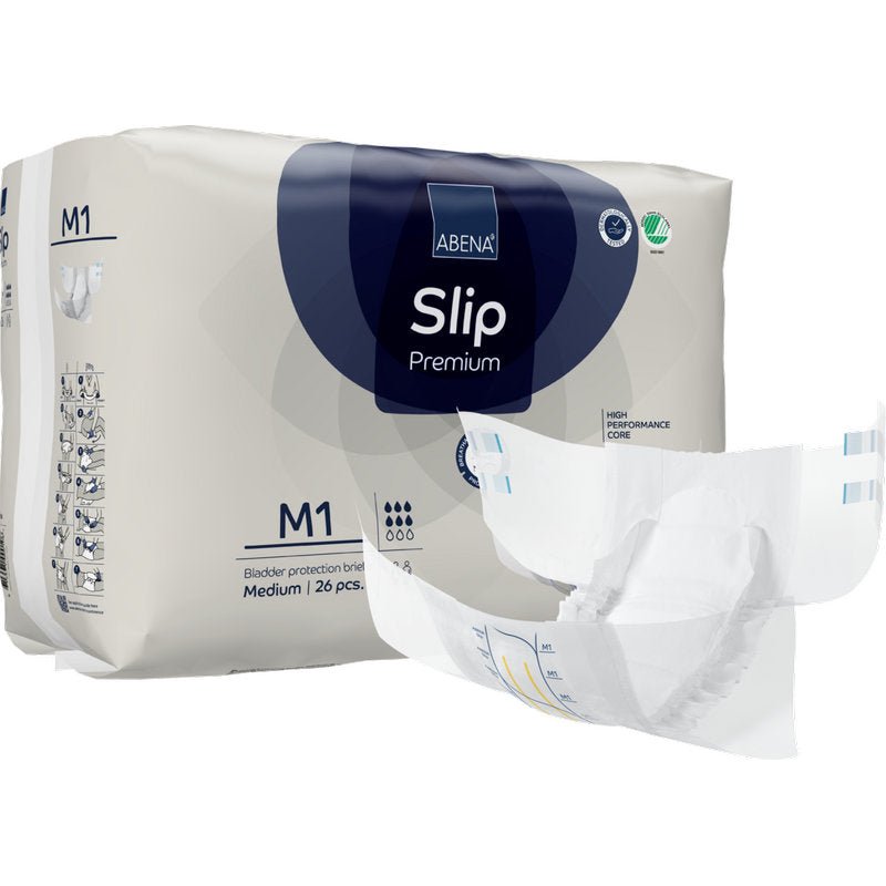 Przedstawione jest opakowanie z napisem "ABENA Slip Premium" od Abena Re-Seller GmbH z rozłożoną pieluchą na pierwszym planie. Opakowanie zawiera 26 średnich sztuk do niezawodnej ochrony przed nietrzymaniem moczu.