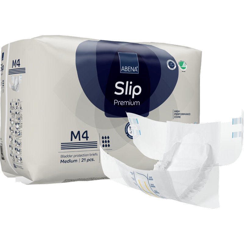 Przedstawione jest opakowanie ABENA Slip Premium od Abena Re-Seller GmbH z nieposkładanym slipem na pierwszym planie. Opakowanie zawiera 21 średnich slipów do niezawodnej ochrony przed nietrzymaniem moczu.