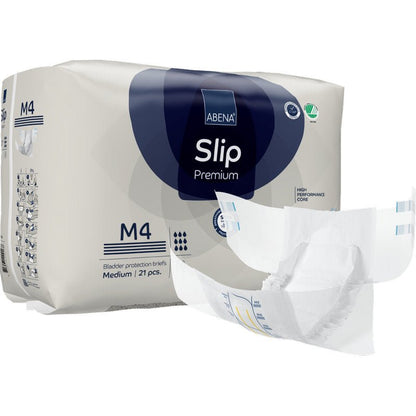Przedstawione jest opakowanie ABENA Slip Premium od Abena Re-Seller GmbH z nieposkładanym slipem na pierwszym planie. Opakowanie zawiera 21 średnich slipów do niezawodnej ochrony przed nietrzymaniem moczu.