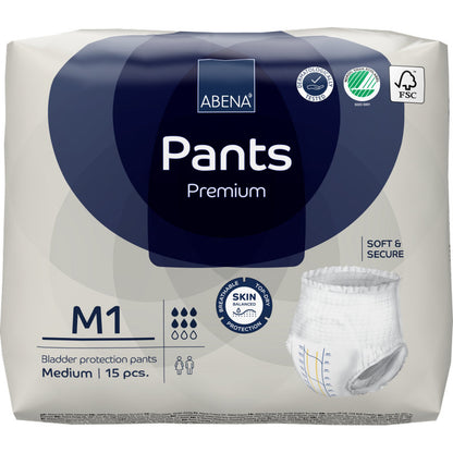 15-pak ABENA Pants Premium M od Abena Re-Seller GmbH jest w większości białym opakowaniu z niebieskimi akcentami, zdjęciami produktów i logotypami certyfikacyjnymi, które podkreślają ochronę premium pęcherza.