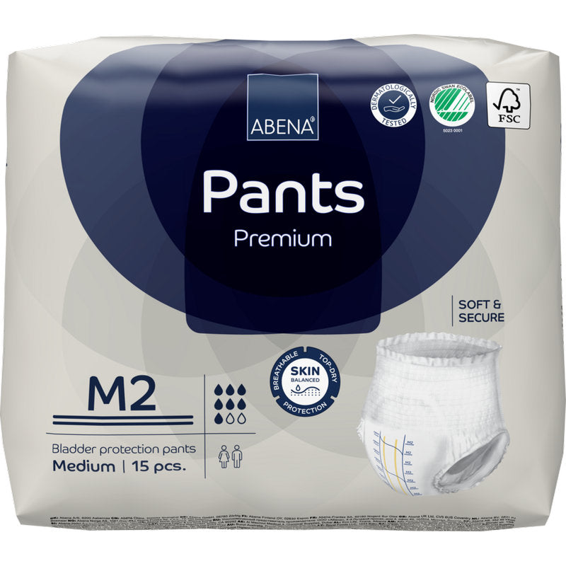 15-częściowe opakowanie ABENA Pants Premium M od Abena Re-Seller GmbH. Biało-niebieskie opakowanie pokazuje ikony dla wysokiej chłonności, ochrony skóry, wchłaniania i certyfikacji ekologicznej.