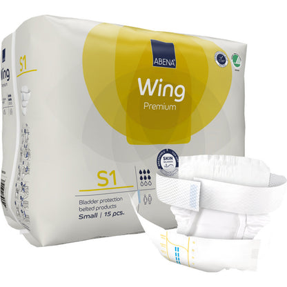 Eine Packung der Abena Re-Seller GmbH ABENA Wing Premium mit einer aufgefalteten weißen Erwachsenenwindel auf der Vorderseite; die Verpackung zeigt 15 kleinformatige Exemplare, die zuverlässigen Schutz und Komfort für die Anwender bieten.