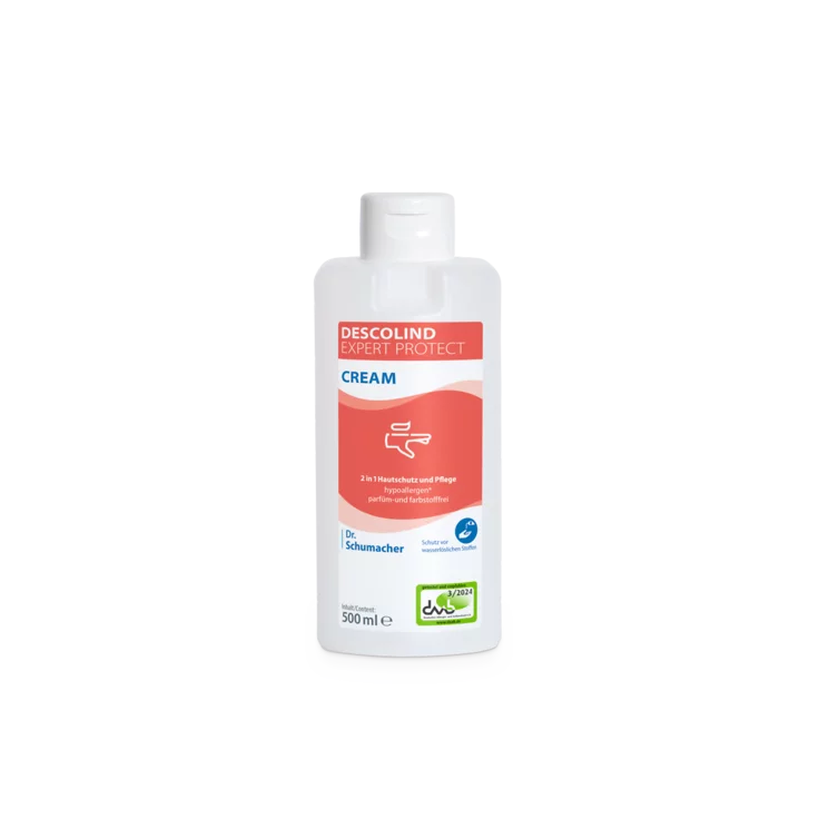 Biała butelka 500 ml kremu ochronnego do skóry Dr. Schumacher Descolind Expert Protect Cream firmy Dr. Schumacher GmbH z czerwono-białą etykietą, idealna dla rąk podatnych na alergie, stoi na jasnym tle.