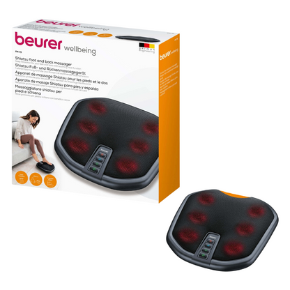 Obraz przedstawia Beurer urządzenie do masażu stóp i pleców FM 70 Shiatsu i podkreśla jego funkcję podgrzewania. Czarne urządzenie ma widoczne czerwone węzły masujące i kilka przycisków sterujących. Opakowanie zawiera zdjęcie osoby korzystającej z masażu stóp i pleców oraz szczegóły produktu w kilku językach.