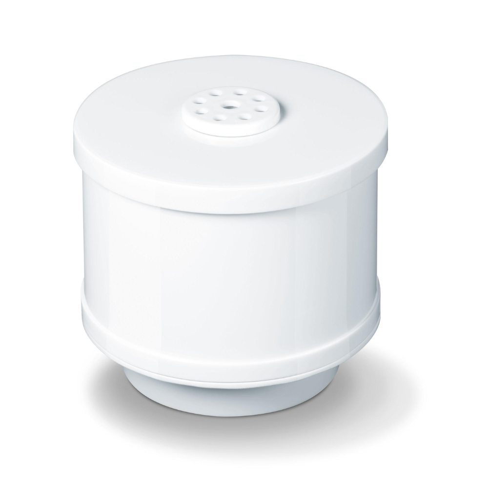 Biały cylindryczny Beurer LB 44, LB 45, LB 88 filtr wapienny od Beurer GmbH leży na białej powierzchni. Filtr ma perforowaną górną część i gładką zewnętrzną stronę z nieco szerszą podstawą i górną częścią, co powoduje subtelne wybrzuszenie w środku.