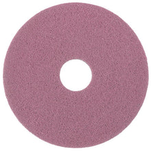 Das Diversey Twister Pad Pink für Vinylböden von Diversey Deutschland GmbH & Co. OHG ist ein rundes, rosafarbenes Reinigungspad mit zentralem Loch und rauer Textur, ideal für harte Reinigungsarbeiten auf Vinylböden mit mikroskopischen Diamanten.
