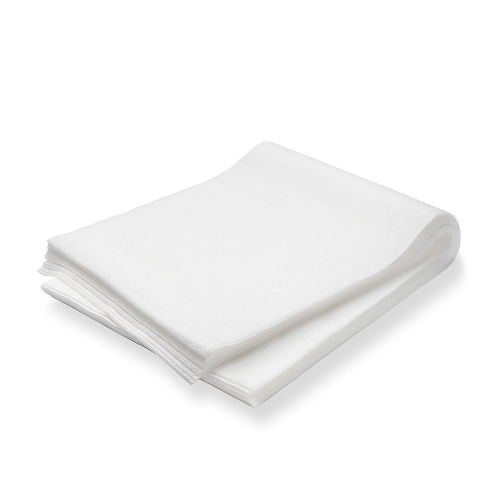 Opakowanie zawierające 100 ściereczek TASKI (60 x 25 cm, nasączonych olejem) od Diversey Deutschland GmbH & Co. OHG jest czysto ułożone na białej powierzchni - idealne do codziennej pielęgnacji i usuwania kurzu na podłogach pokrytych i niepokrytych.