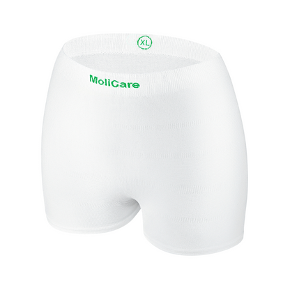 Białe jednorazowe majtki siatkowe Hartmann MoliCare® Fixpants firmy Paul Hartmann AG, zielone z napisem „XL“ na białym tle. Zaprojektowane dla dorosłych, idealne do mocowania wkładek na nietrzymanie moczu z bezszwowym, bezpiecznym dopasowaniem.