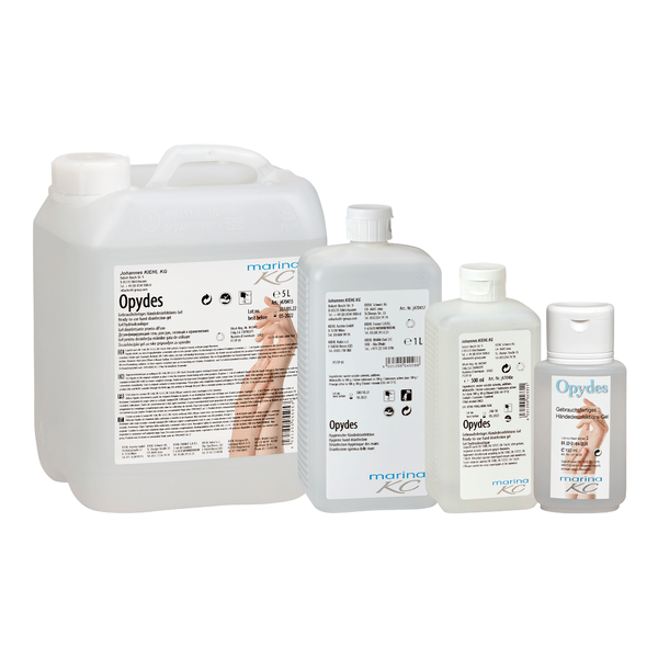 Przedstawione są cztery przezroczyste butelki Kiehl Opydes Higieniczna Dezynfekcja Rąk firmy Johannes Kiehl KG w różnych rozmiarach ustawione w rzędzie. Mają białe i niebieskie napisy z symbolami rąk do higienicznej dezynfekcji rąk i redukcji zarazków.