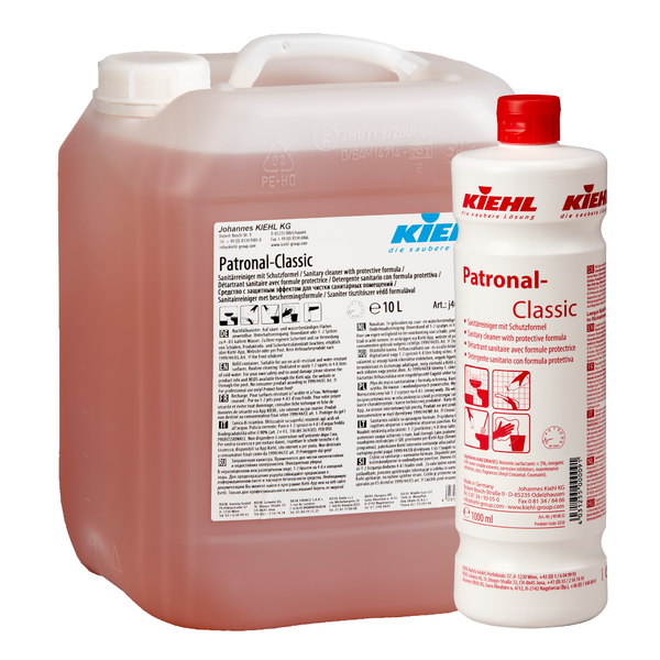Dwa opakowania środka czyszczącego do sanitariatów Kiehl Patronal-Classic z formułą ochronną firmy Johannes Kiehl KG - jeden 10-litrowy kanister i jedna 1-litrowa butelka, oba z białą etykietą i czerwonym napisem; z biodegradowalną recepturą.