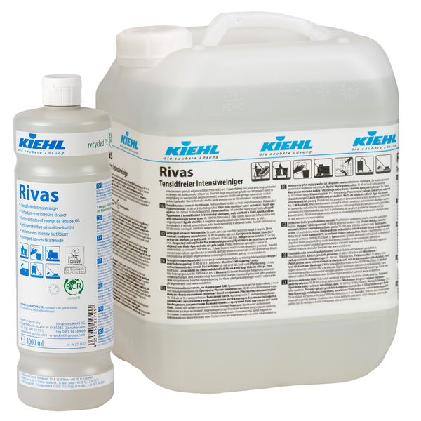 Przedstawione są 1-litrowa butelka i większy kanister Kiehl Rivas Środek czyszczący bez detergentów firmy Johannes Kiehl KG, oba z białą etykietą i niebieskim brandingiem dla tego środka czyszczącego bez detergentów do różnych powierzchni.