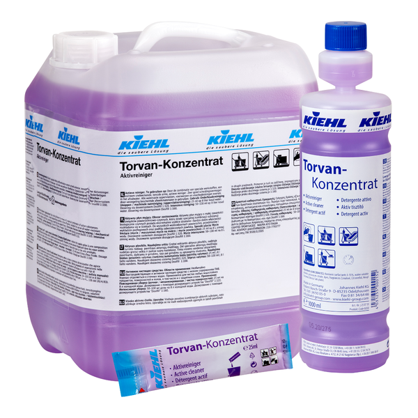 Zestaw firmy Johannes Kiehl KG Kiehl Torvan-Konzentrat Aktivreiniger składa się z pojemnika o pojemności 5 litrów, butelki 1-litrowej i saszetki z fioletowym płynem oraz białym opakowaniem z niemiecką etykietą.