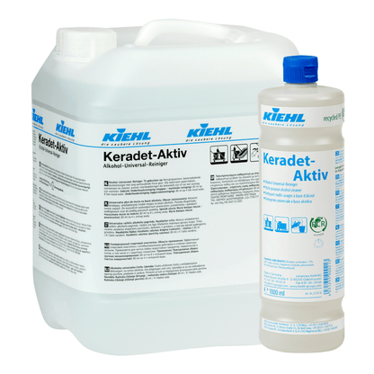 Dwa opakowania Kiehl Keradet-Aktiv Alkohol-Universal-Reiniger firmy Johannes Kiehl KG: kanister 10L i butelka 1L, oba z niebiesko/czarnym nadrukiem na białych etykietach. Idealne do czyszczenia wszystkich powierzchni.