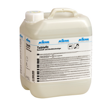 Ein weißer 5-Liter-Kunststoffbehälter des Kiehl Tablefit Kunststoff- und Schreibtischreinigers der Johannes Kiehl KG mit einem Schraubverschluss und einem großen Produktetikett mit deutschem Text und verschiedenen Symbolen.