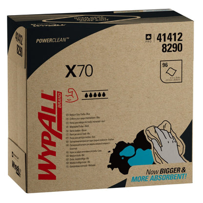 Karton firmy Kimberly-Clark GmbH WypAll® X70 PowerClean Zupfbox/Blau (10 kartonów x 100 arkuszy) pokazuje informacje o produkcie, ilustrację dłoni w kolorze niebiesko-czarnym i tekst "Now BIGGER & MORE ABSORBENT!" dla profesjonalnego czyszczenia.