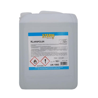 Biały 10-litrowy plastikowy pojemnik z napisem "STERN Klarspüler S" Stern Waschmittel GmbH, z niemiecką instrukcją obsługi jako płyn nabłyszczający do zmywarki zapewniający połysk bez smug i symbolami zagrożeń dotyczącymi łatwopalności i ostrożności.