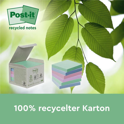 Otwarta pudełko z pastelowymi karteczkami samoprzylepnymi Post-it® Recycling Notes (38 mm x 51 mm, 100 arkuszy/blok, 100% PEFC) firmy 3M Deutschland GmbH leży obok stosu karteczek, za którymi znajdują się zielone liście. Tekst: „100% z recyklingu karton” i „karteczki z recyklingu”.