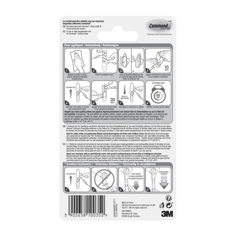 Tył opakowania metalowych haków Command™ "klasycznych" (3M Deutschland GmbH) z ilustrowaną, wielojęzyczną instrukcją użycia i usuwania oraz kodem kreskowym na dole.