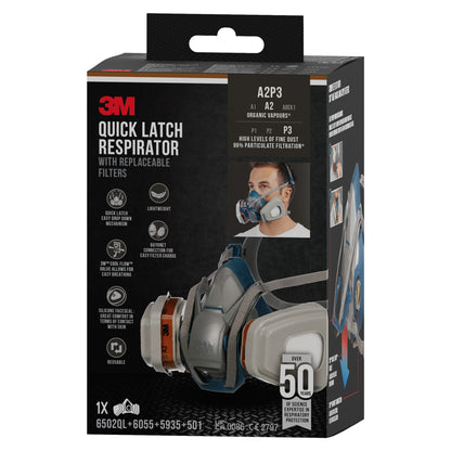 Czarno-szare pudełko maski ochronnej 3M™ Quick Latch 6502QLKIT-1 firmy 3M Deutschland GmbH z wymiennymi filtrami A2P3, zdjęciami produktu, symbolami użytkowania, danymi technicznymi i zdjęciem osoby z maską na przedniej stronie.